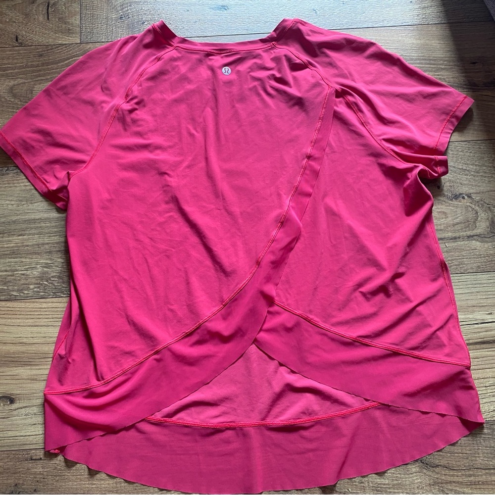Lululemon Quick Pace Short Sleeve
Fuchsia Pink Size 12 - Picture 5 of 5